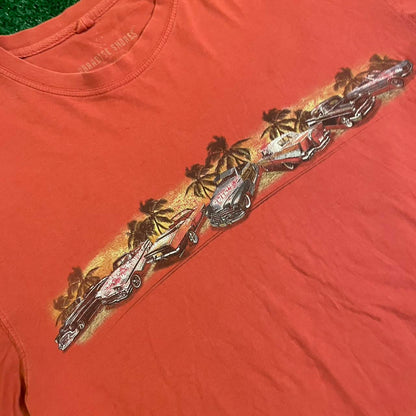Orange Graphic Tee w/ Unique Design, Featuring a bold Hawaiian racing, eye-catching print