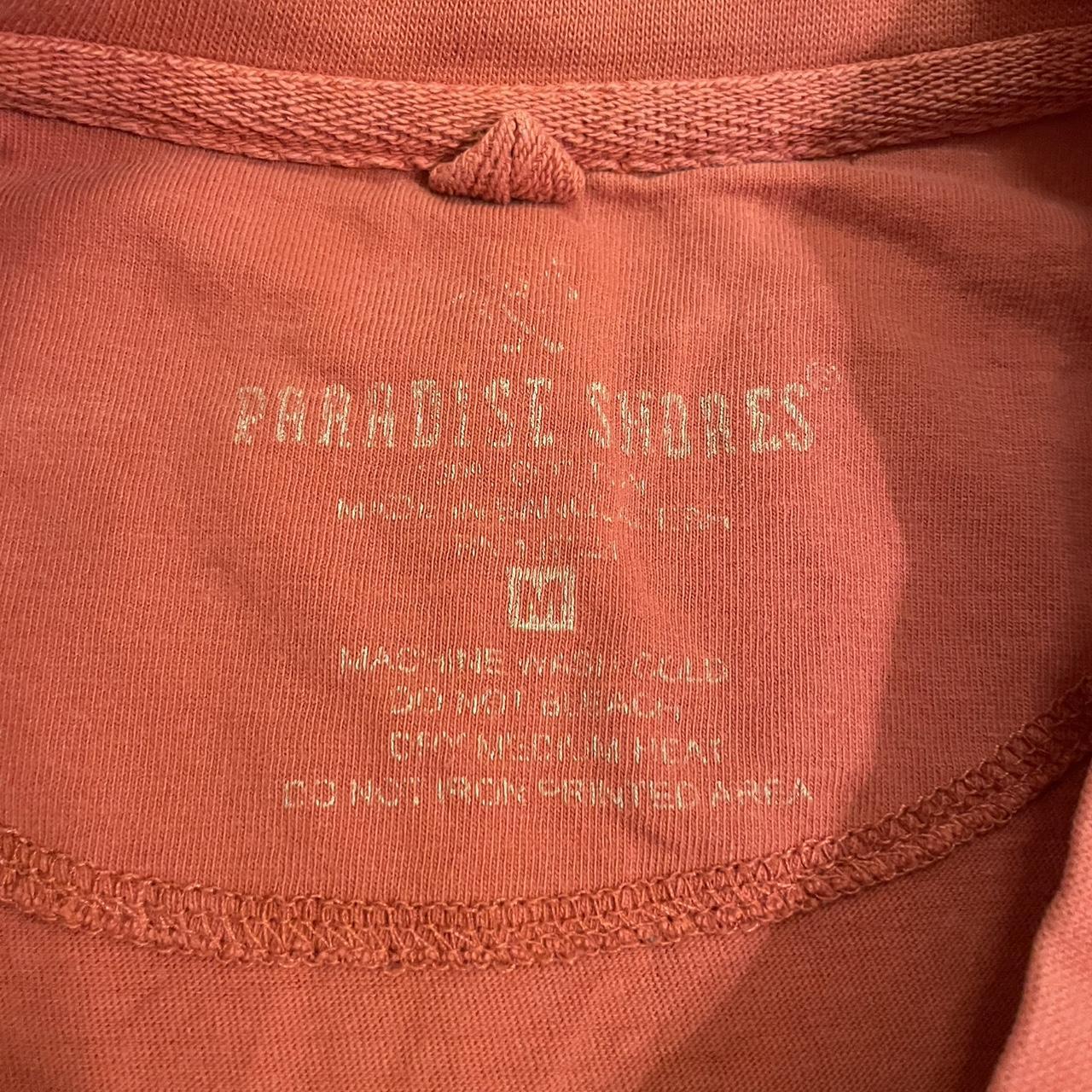 Orange Graphic Tee w/ Unique Design, Featuring a bold Hawaiian racing, eye-catching print