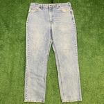 Light Washed Carhartt Jeans w/ A Relaxed Fit