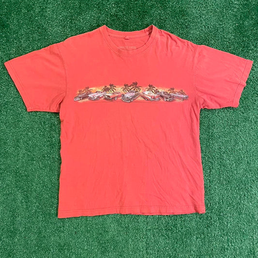 Orange Graphic Tee w/ Unique Design, Featuring a bold Hawaiian racing, eye-catching print